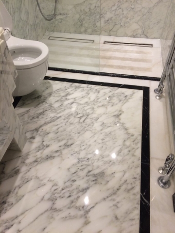 Marble bathroom floor after polishing