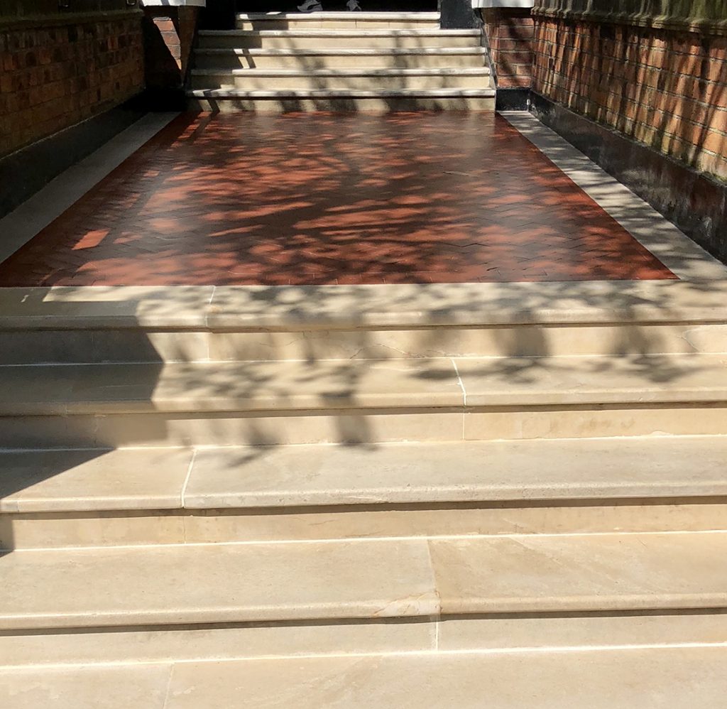 Repaired marble steps and path way closeup